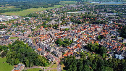 Aerial around the old town of the city Steenwijk in the Netherlands during a sunny day in summer