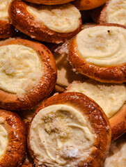 Freshly baked buns with cottage cheese, close-up.
