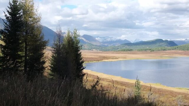 Lake Yazevoye or Karakol in Katon - Karagay Park Altai sunny autumn in Kazakhstan