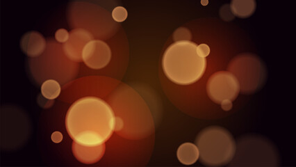 Golden bokeh lights on black background. Abstract glowing backdrop with magic light effect