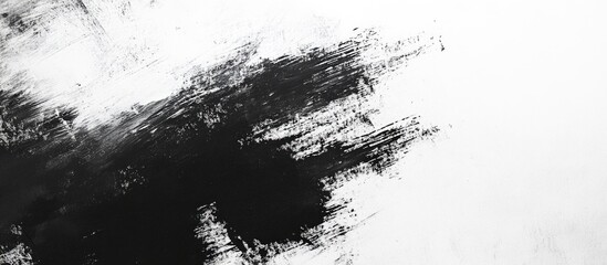 Fototapeta premium Abstract grey and black brush stroke on textured white background perfect for showcasing creative designs or adding text elements.