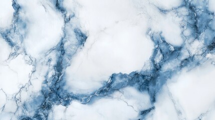 Elegant white marble surface adorned with intricate blue veining patterns for upscale design projects and backgrounds.