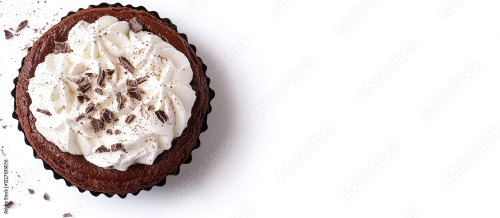 Poster chocolate cake topped with whipped cream and chocolate shavings on a white background with space for
