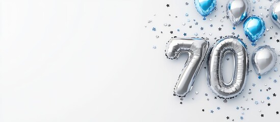 Silver foil number 70 balloons on a festive background ideal for New Year celebrations and anniversaries perfect for holiday designs and promotions