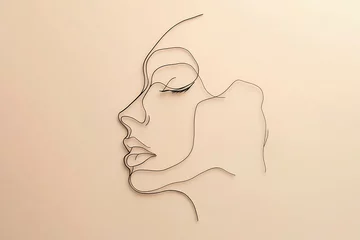 Minimalistic one line drawing of a woman face.