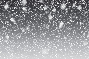 A contemporary heavy snowfall features snowflakes of diverse shapes and sizes. Snowflakes drifting against a snowy background. Christmas-themed snowfall