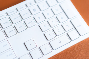 Close-up of a White Computer Keyboard with Numeric Keypad