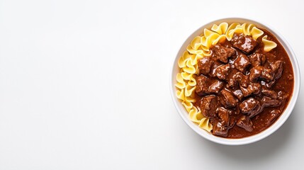 Obraz premium Delicious Beef Stroganoff with Egg Noodles on White Background