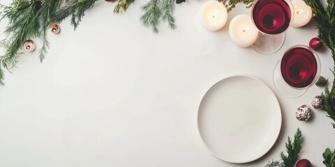 Elegant Holiday Table Setting with Candles Red Wine Glasses Branches and Empty Space for Text on a Light Background
