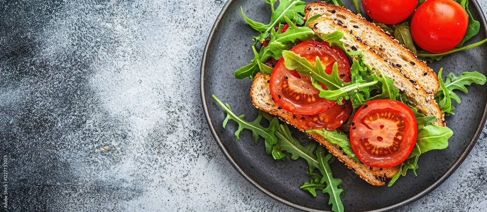 Aufkleber fresh sandwich with tomatoes and arugula on a plate surrounded by empty space for text for advertisi