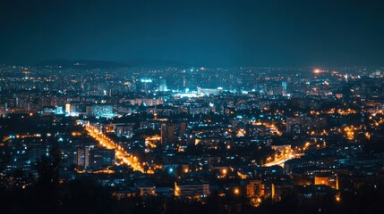 Obraz premium Night Cityscape: An Aerial View of Urban Lights