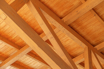 Construction of a wooden roof of a frame house.
