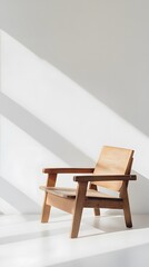 Fototapeta premium 45. A simple wooden armchair with a natural finish and minimalistic design, placed on white