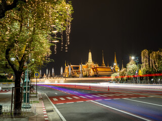 The Grand Palace or  Wat Phra Kaew illuminated at night, captured with a long exposure. These are iconic landmarks in Bangkok.