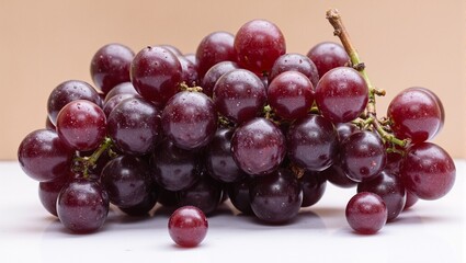 Fresh purple grapes with a soft glow some scattered
