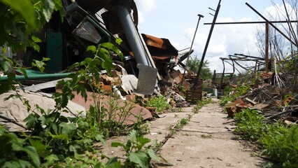 View to destroyed residential buildings at Kharkivska oblast. Ruined houses after bomb attacks on...