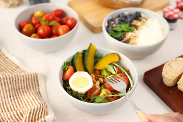 Green mix vegan salad with pumpkin
