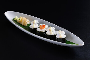 Shrimp tempura roll Maki sushi Japanese food Japanese seafood isolate in black background