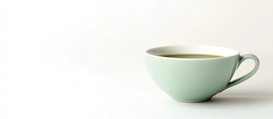 Green matcha tea in a light green cup isolated on white background with ample empty space for text or branding purposes