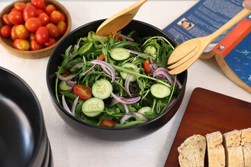 Green mix vegan salad from green leaves mix and vegetables in isolate white background