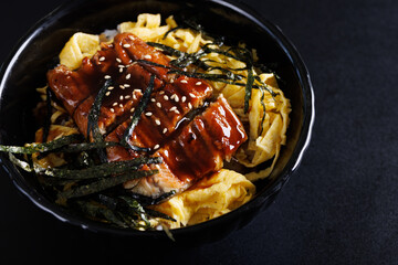 Teriyaki Pork with rice japanese food isolate in black background