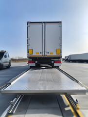 Naklejka premium A truck or trailer carrying cargo undergoes a weighing procedure on truck scales. Neural network AI generated art