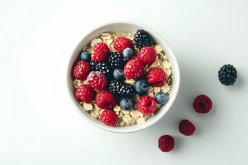 Oatmeal bowl with fresh berries on a white background.