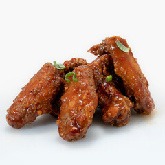 Korean Gochujang Glazed Chicken Wings isolated on a white background