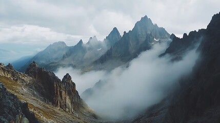 Peaceful mountain landscape with lush forests and clear blue sky above