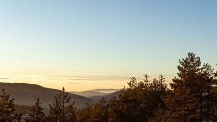 Obraz premium Sunset Over Mountain Landscape 