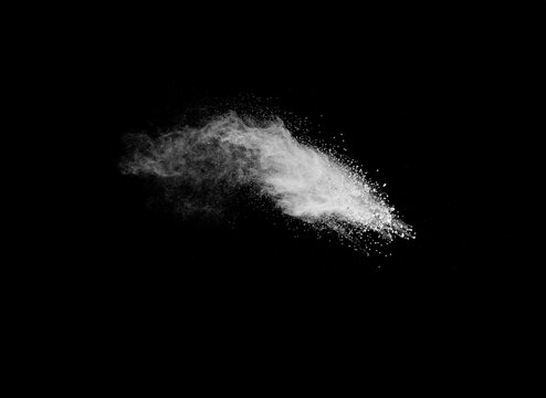 White cloud of powdery substance is in the air