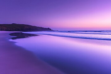 Fototapeta premium A serene beach at twilight, soft waves reflecting the gradient of the sky and sands glowing in the dim light