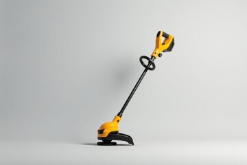A Sleek Yellow and Black Cordless Weed Eater Ready for Landscaping Tasks