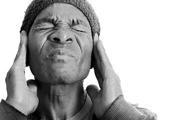 man suffering from deafness and hearing loss on grey background with people stock photo