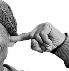 man suffering from deafness and hearing loss on grey background with people stock photo