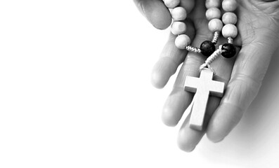 man praying to god with hands together Caribbean man praying with background with people stock photo stock image