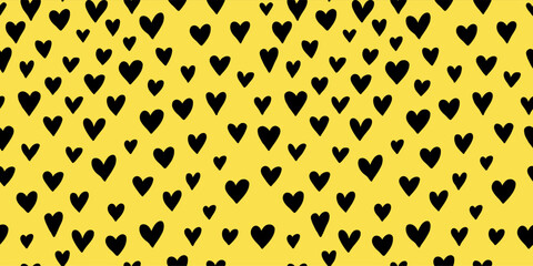 Hand drawn seamless black and yellow doodle pattern with hearts. A playful, modern design, perfect for Valentines Day, textiles, packaging, wallpapers, and more. Vector illustration in bold colors.