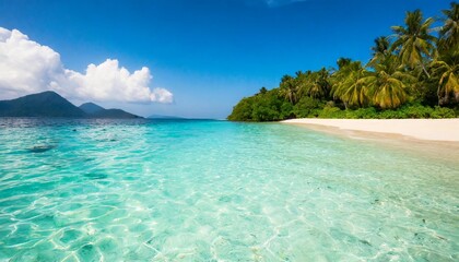 Fototapeta premium A breathtaking view of a remote tropical island with white sandy beaches and crystal-clear turquoise water under a bright sunny sky.