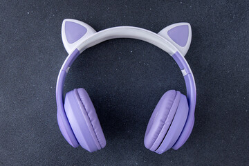 Wireless Headphones on black background. Cat ears