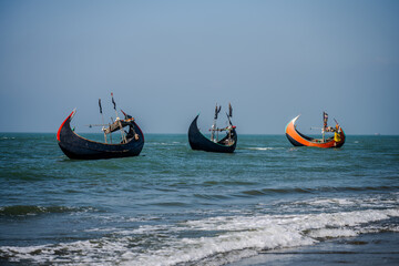 Traditional Wooden Fishing Boats Floating on the Bay of Bengal, Cox's Bazar, Bangladesh