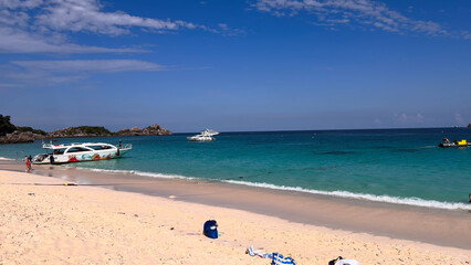 Trip to Thailand. Travel photo.
Sea, sun, beach, island.
Summer vacation. Boat, yacht on azure water.
Thai resort. Krabi, Phi phi, Andaman beach.