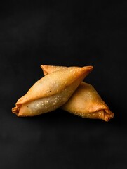 Fototapeta premium Tasty baked goods with a crunchy exterior and soft interior, often filled with sweet fillings.