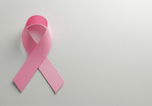 Pink ribbon for breast cancer awareness on white background. Pink ribbon symbol of breast cancer awareness