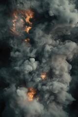 Close up of thick black smoke with small bursts of flame indicating recent explosion. Conveys danger, pollution and industrial chaos.