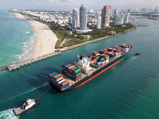 Freight container cargo vessel. Cargo ship vessel leaving port. Container ship. Export and import....