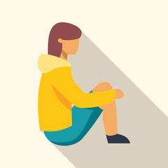 Side view of a thoughtful young woman sitting on the floor hugging her knees, lost in her thoughts