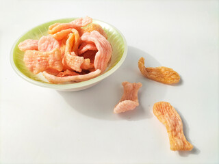 a bowl of fish crackers