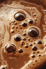 Coffee bubbles texture close-up, espresso foam, and liquid details.
