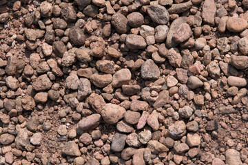 Pile of pebbles on the ground closeup of photo