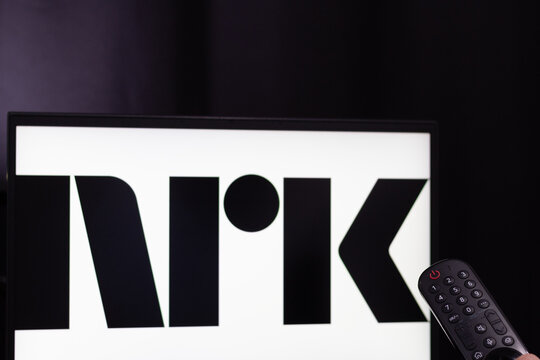 TV screen showing NRK channel, Norway's main public network. Norwegian state broadcasting corporation. Black and white logo with minimalist design.
